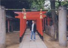 Chris in front of torii gates