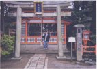 Chris in front of shrine
